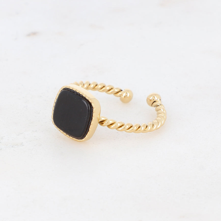 Black onyx waterproof gold ring that have a twist detail and adjustable sizing